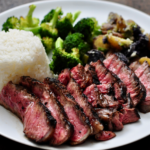 Bone-in rib eye medium rare sliced steak