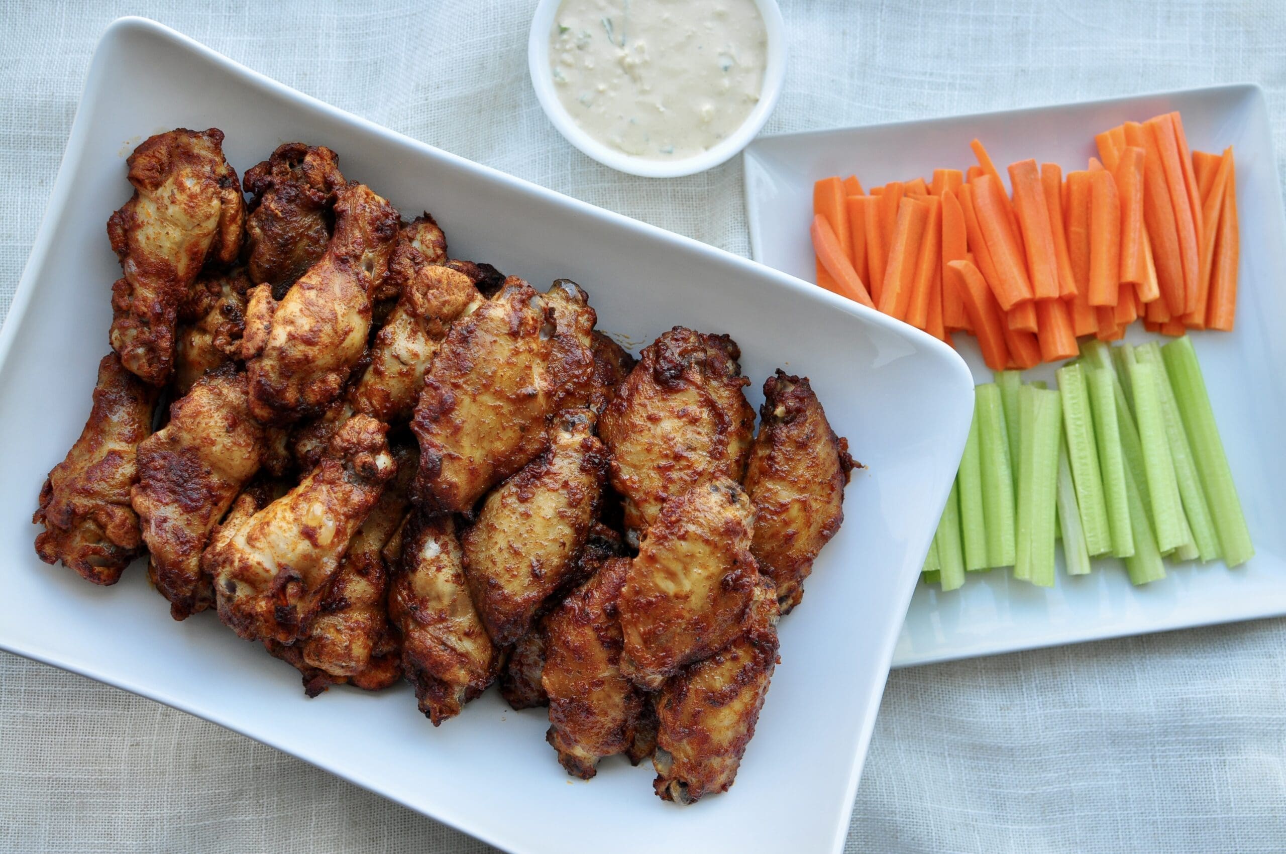 BBQ Party Wings served with celery, carrots, blue cheese dip