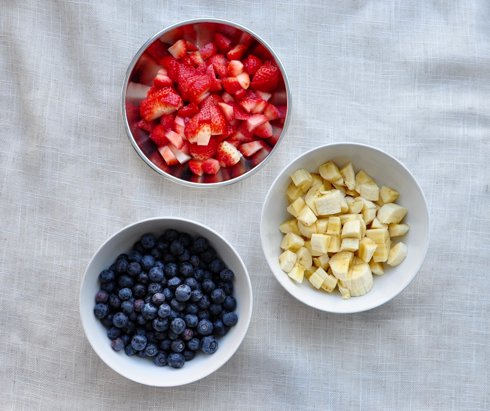 Diced fruit for layering and topping cake. Strawberries, bananas and blueberries