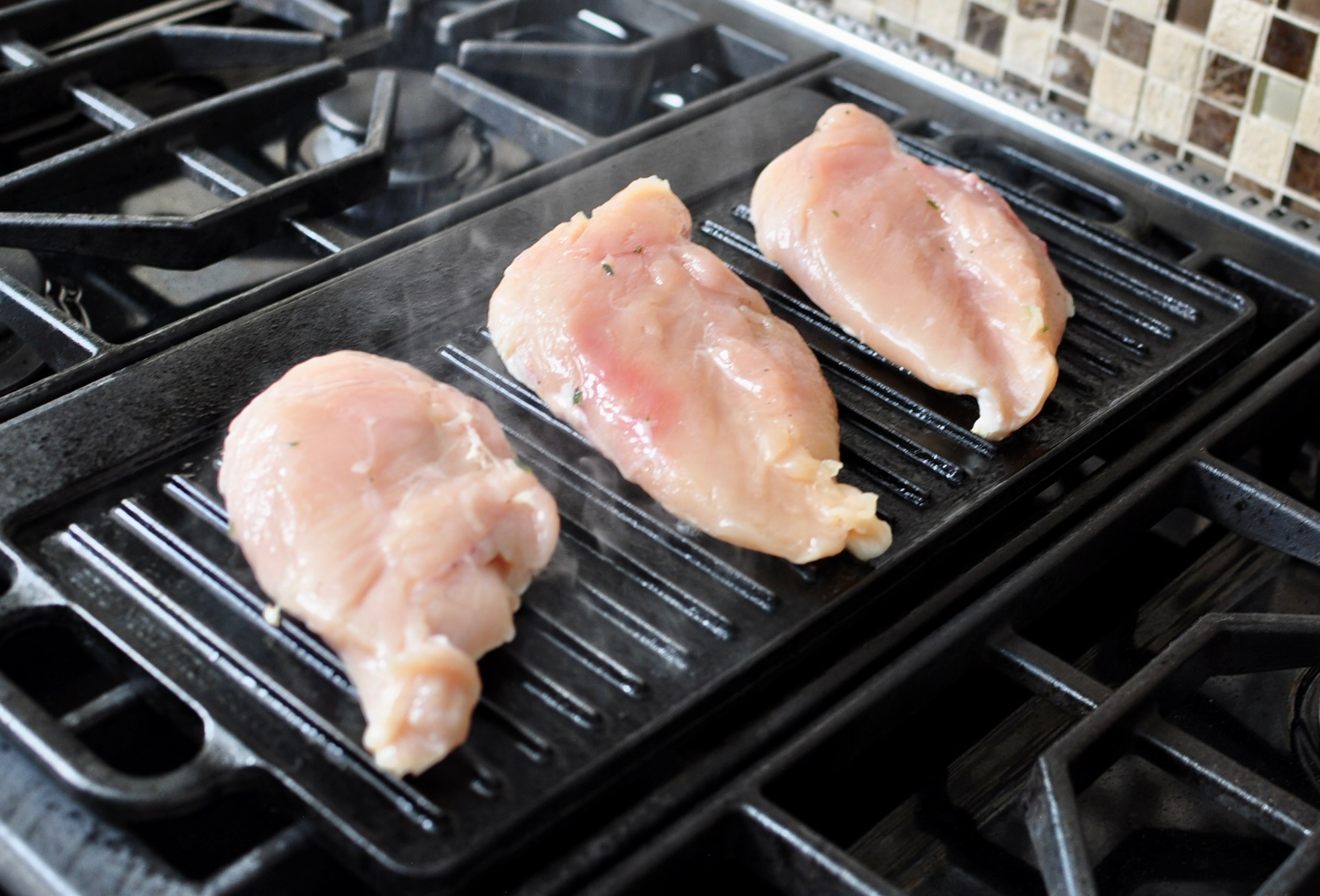 Chicken breasts on the grill