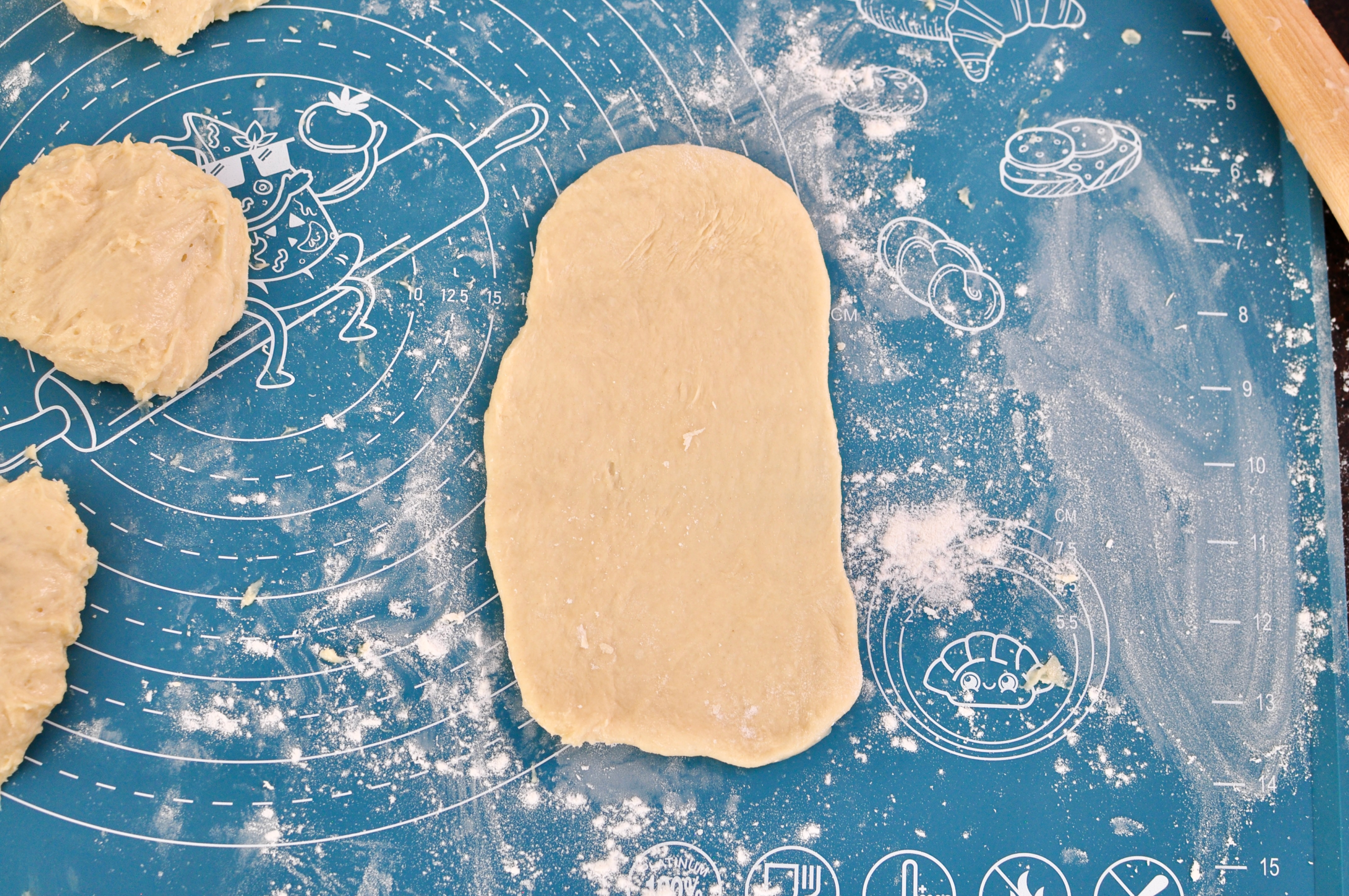 roll the 10 pieces of dough for pull apart bread into rectangles
