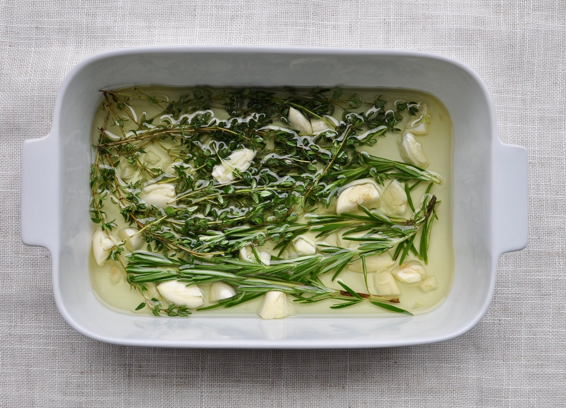 Olive oil infused with rosemary, thyme and garlic