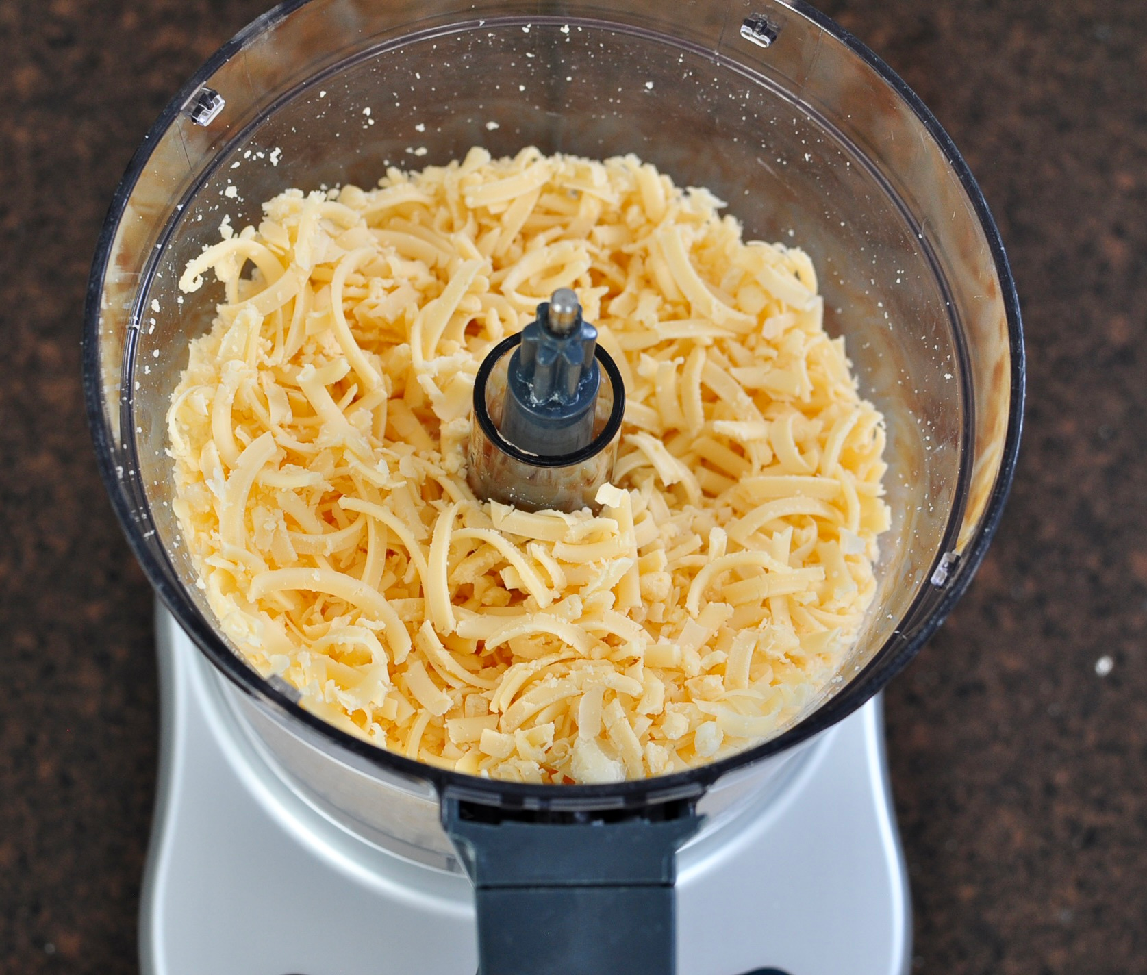 Shredded cheese in food processor