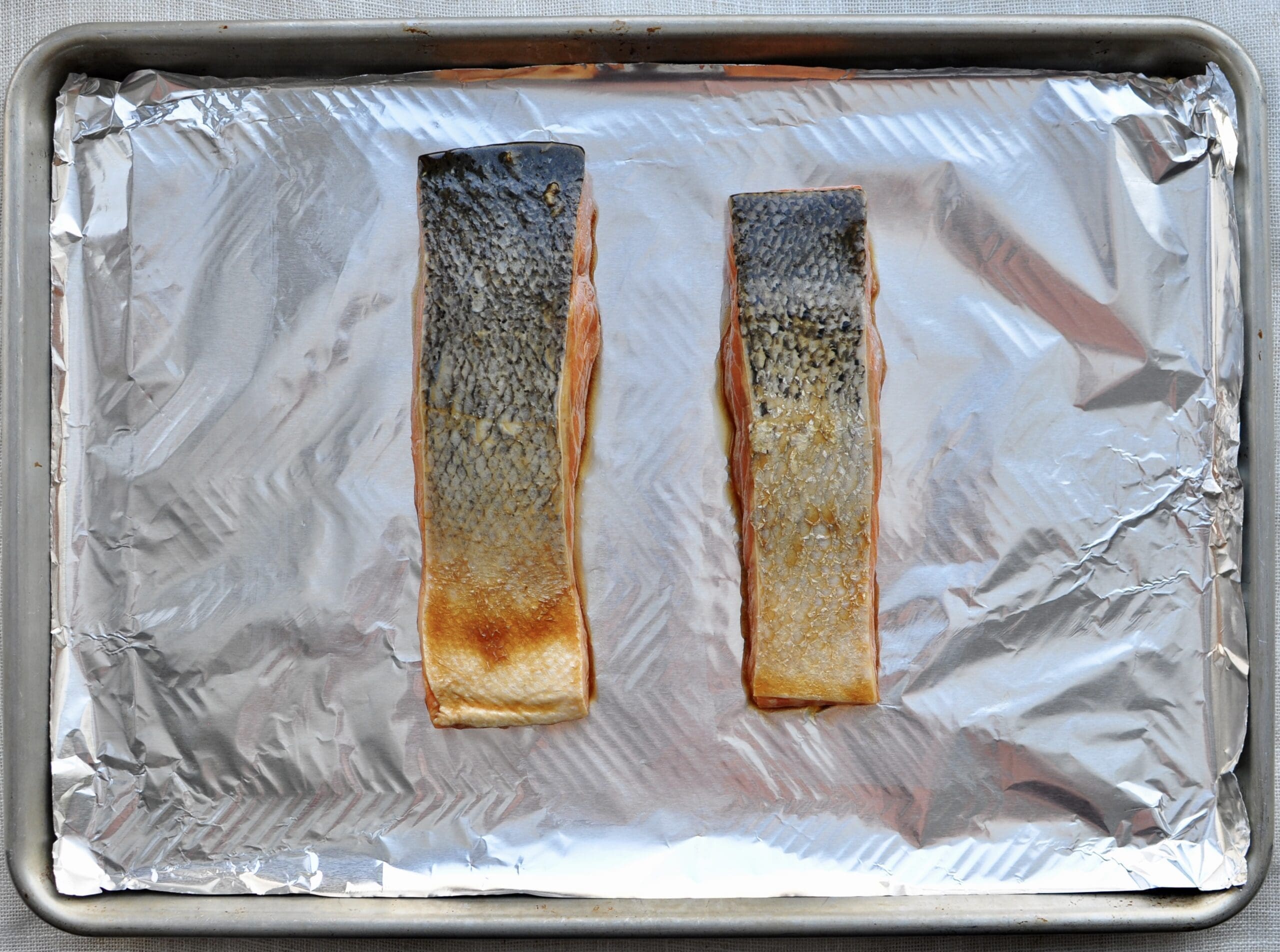 Asian glazed broiled salmon on sheet pan