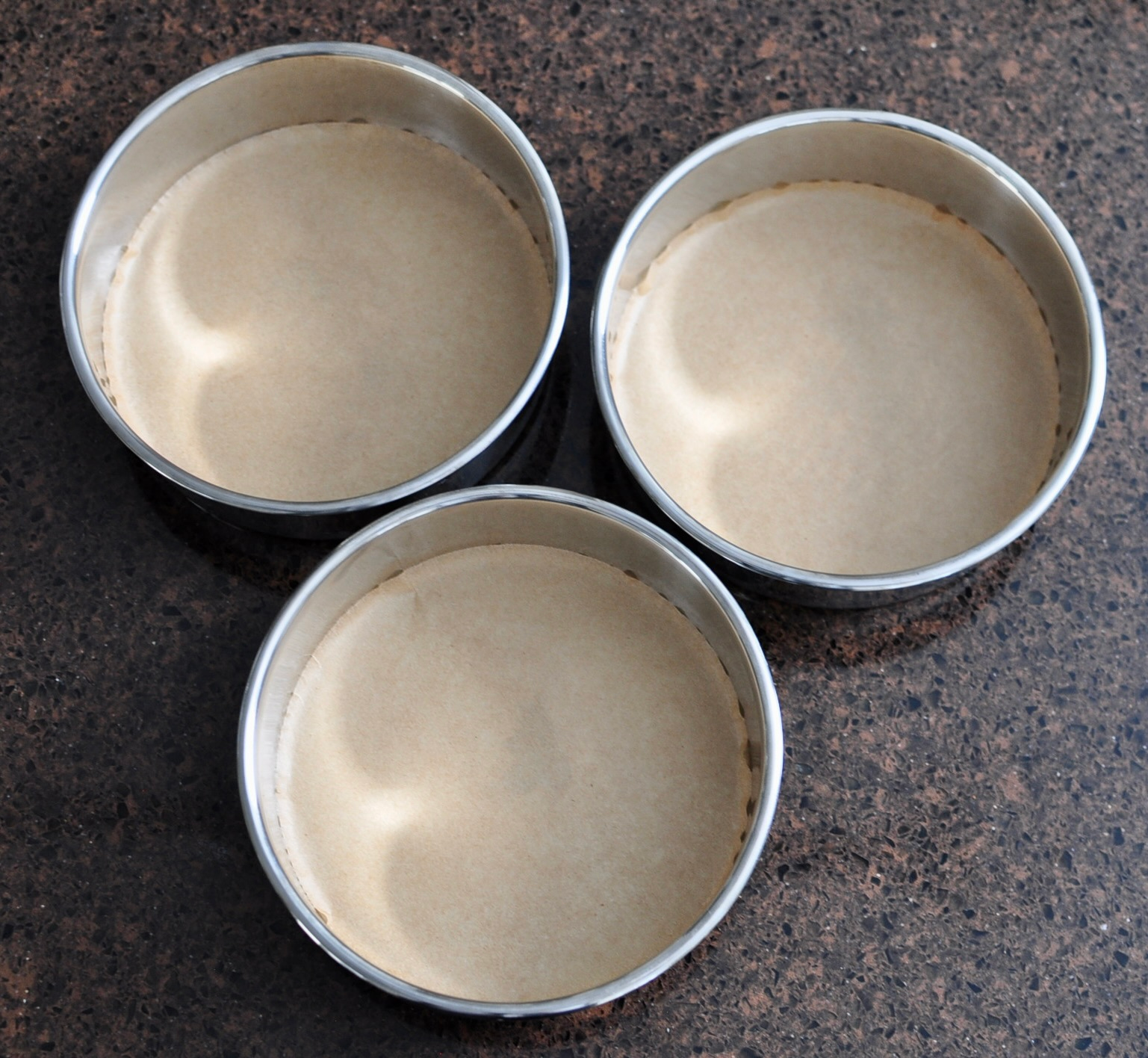 6 inch cake pans lines with parchment paper