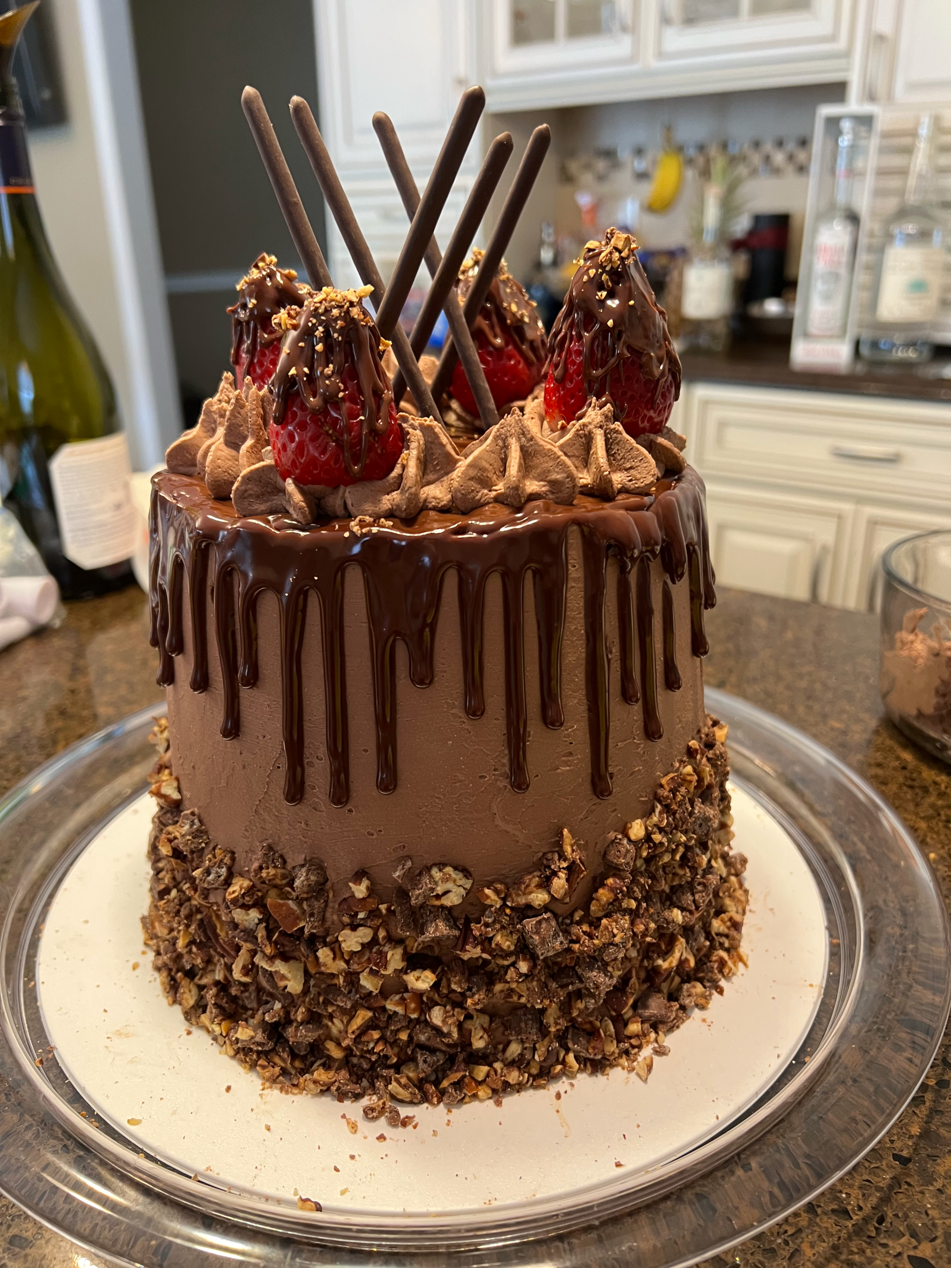 Chocolate layer cake decorated with pocky sticks