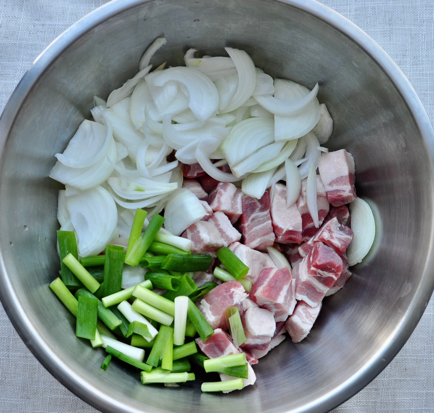 Pork belly, onions and scallions