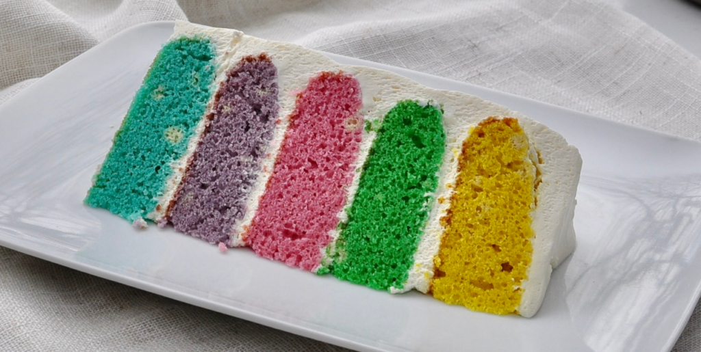 Slice of rainbow cake