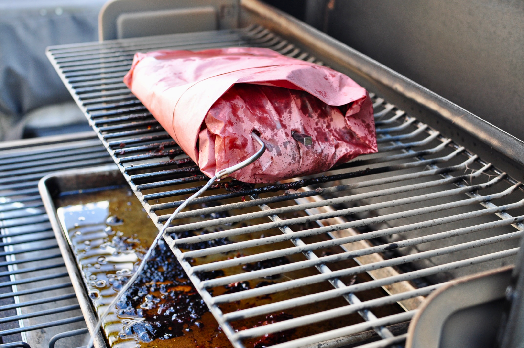 Inserting thermometer on to brisket