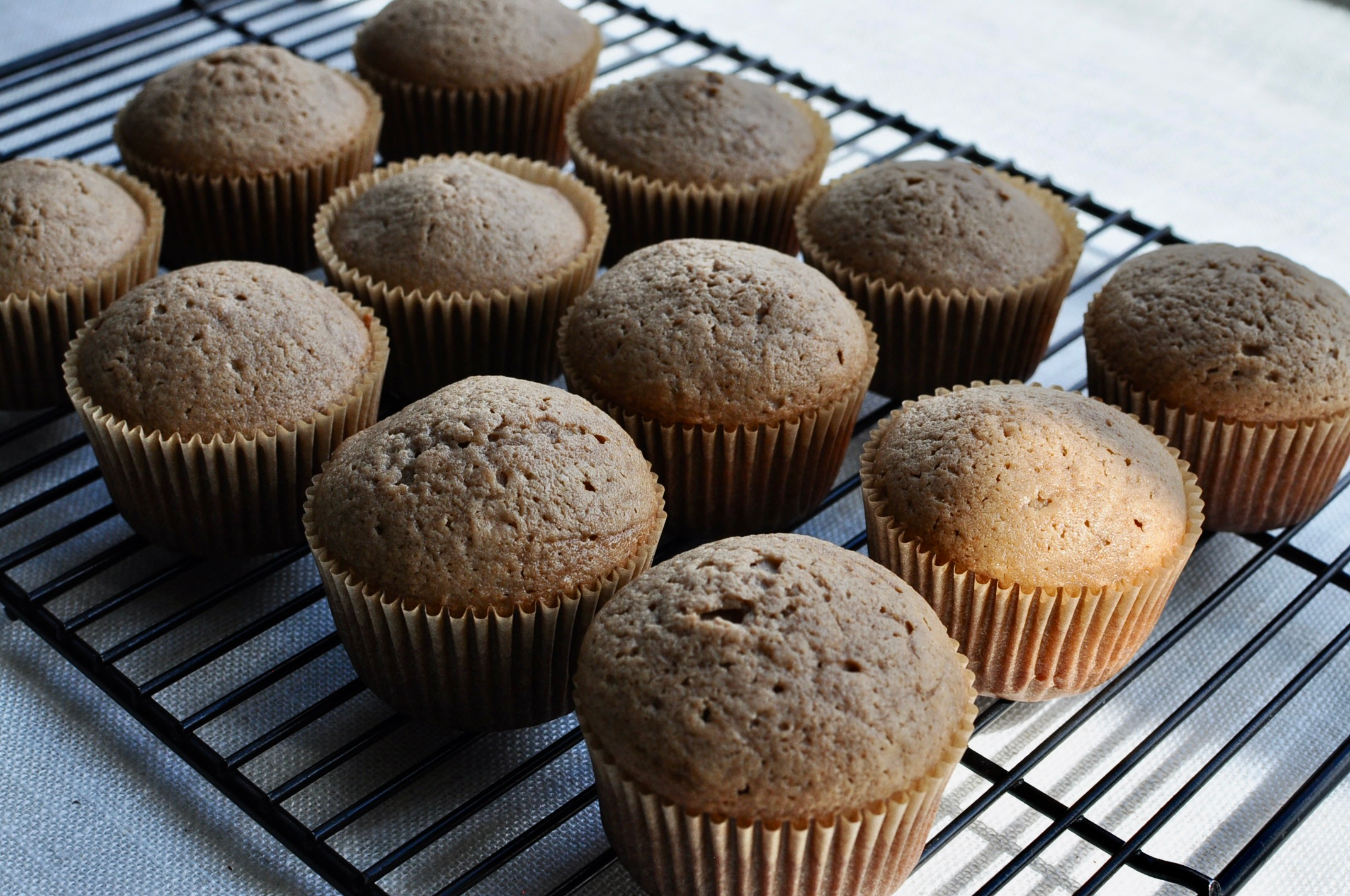 milk tea cupcakes on cooling rack