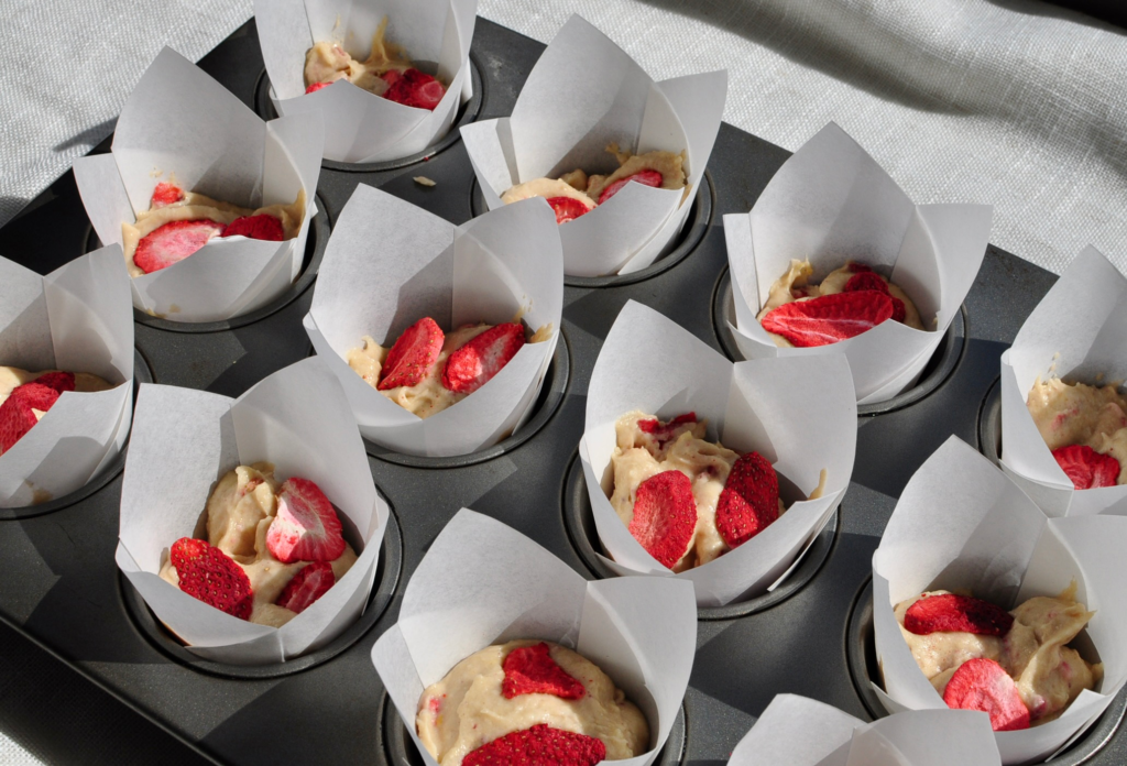 Strawberry Muffins in muffin tin