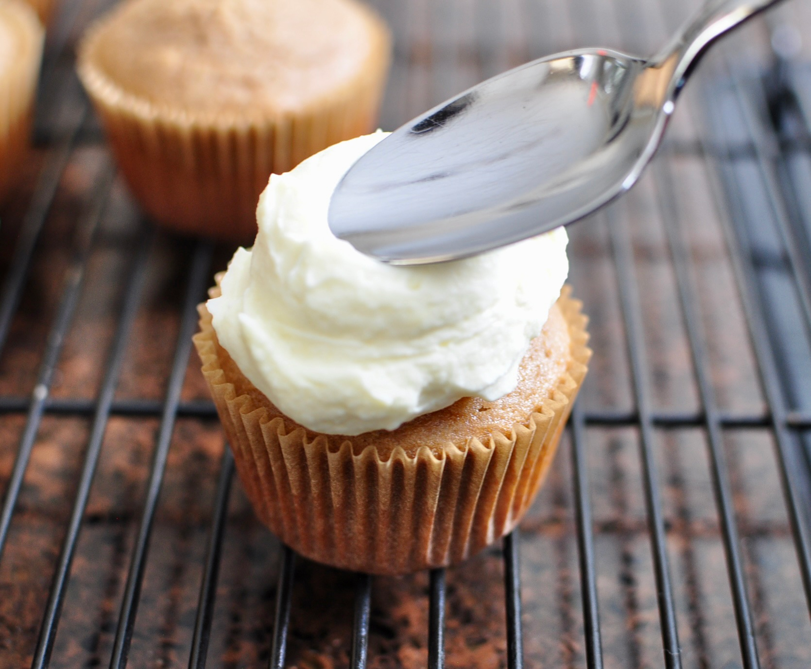 Spoon to decorate frosting on cupcake