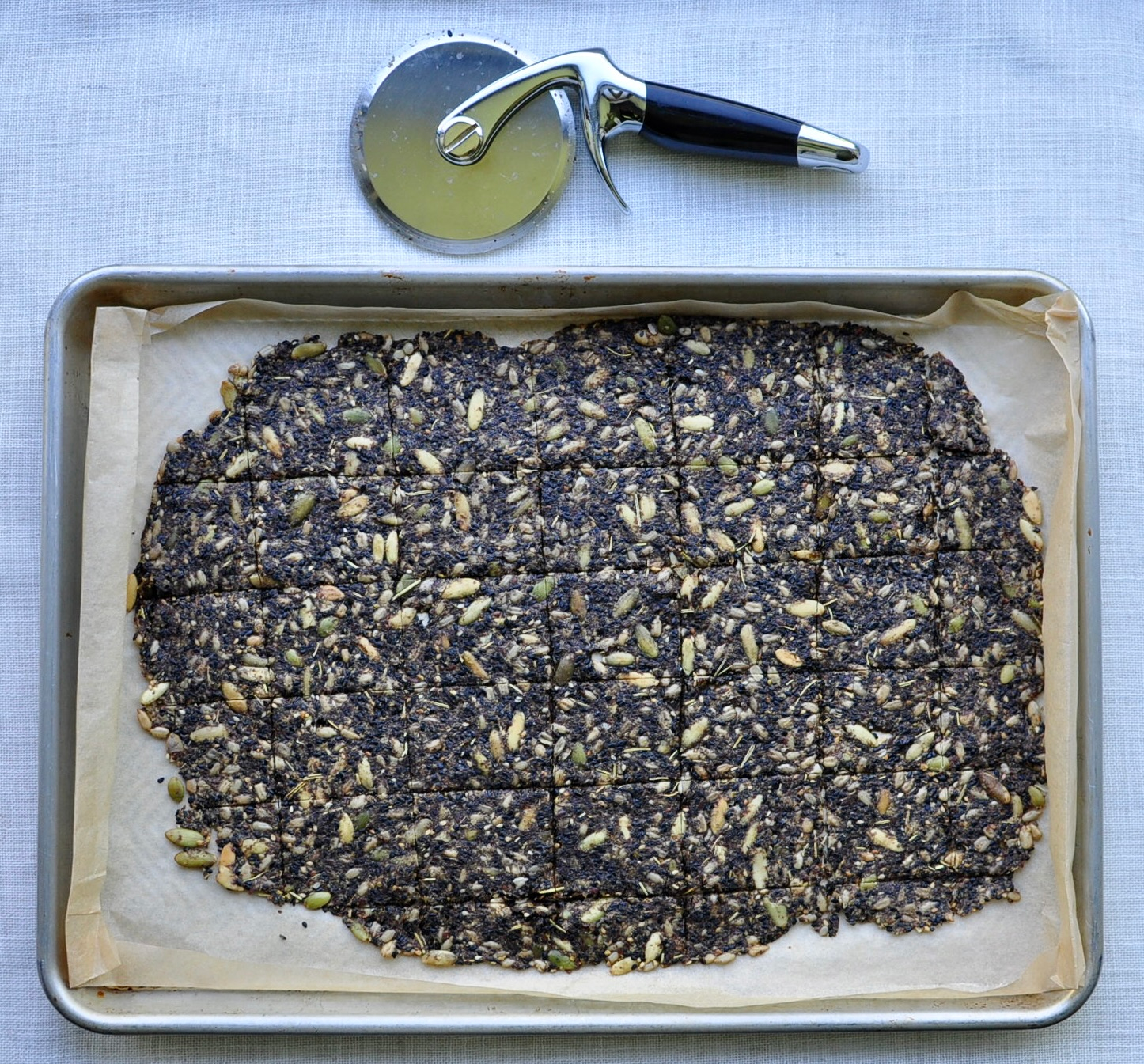 Cut Seed Crackers Halfway Through Baking For An Even Cut