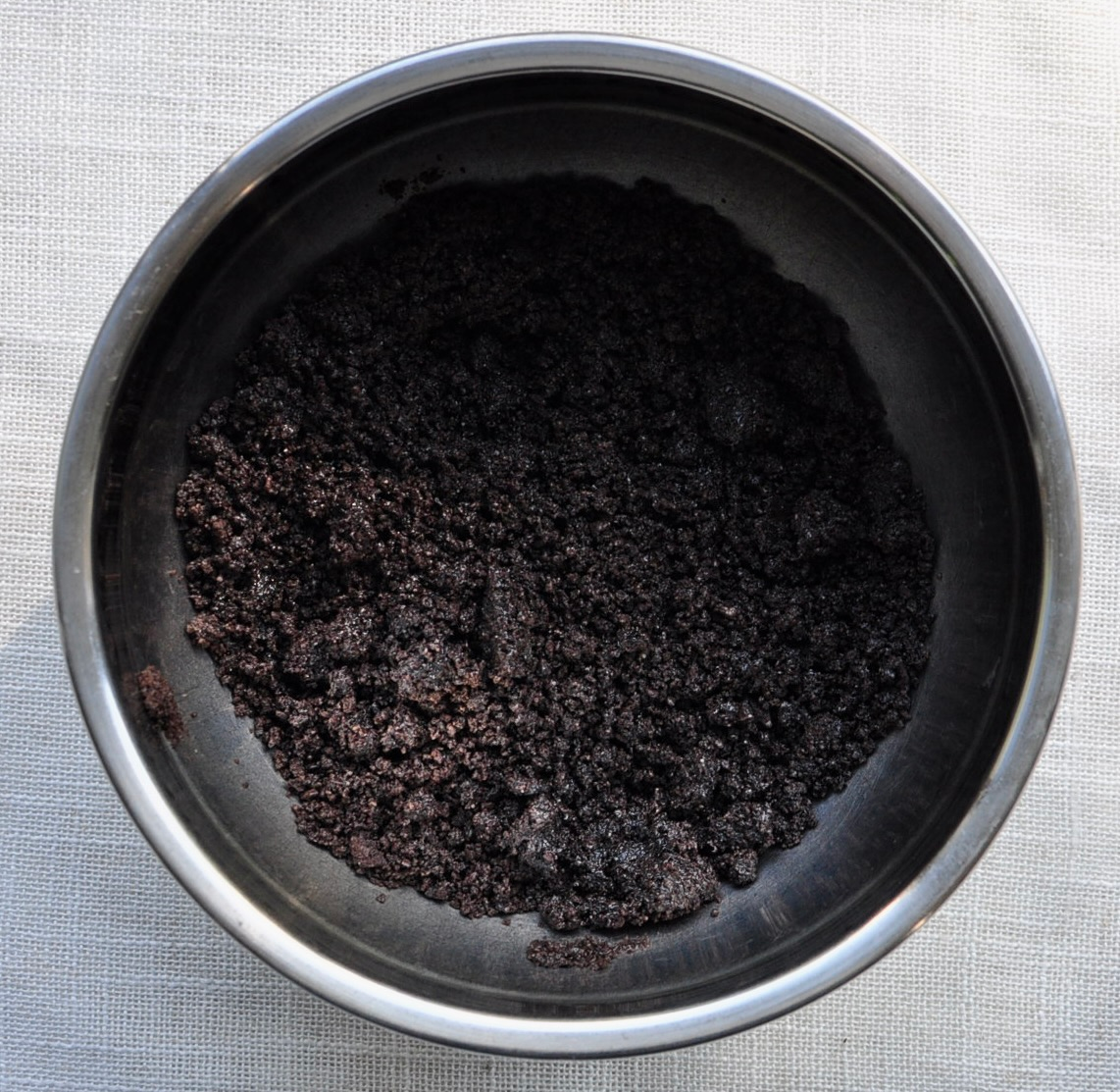 Crushed Oreos and Butter for Cheesecake Crust