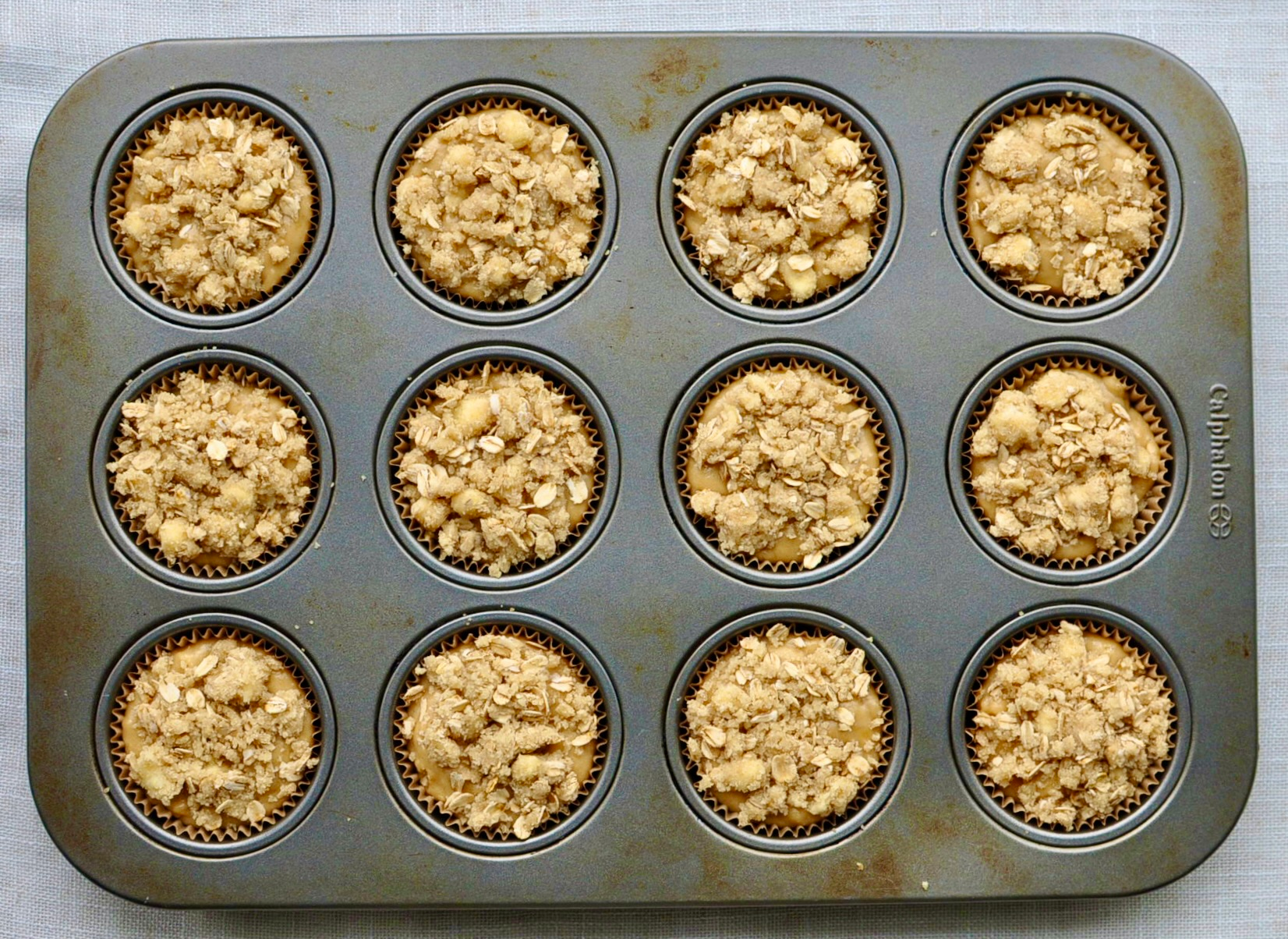 Miso Banana Muffins with Oat Streusel in Tin Before Baking