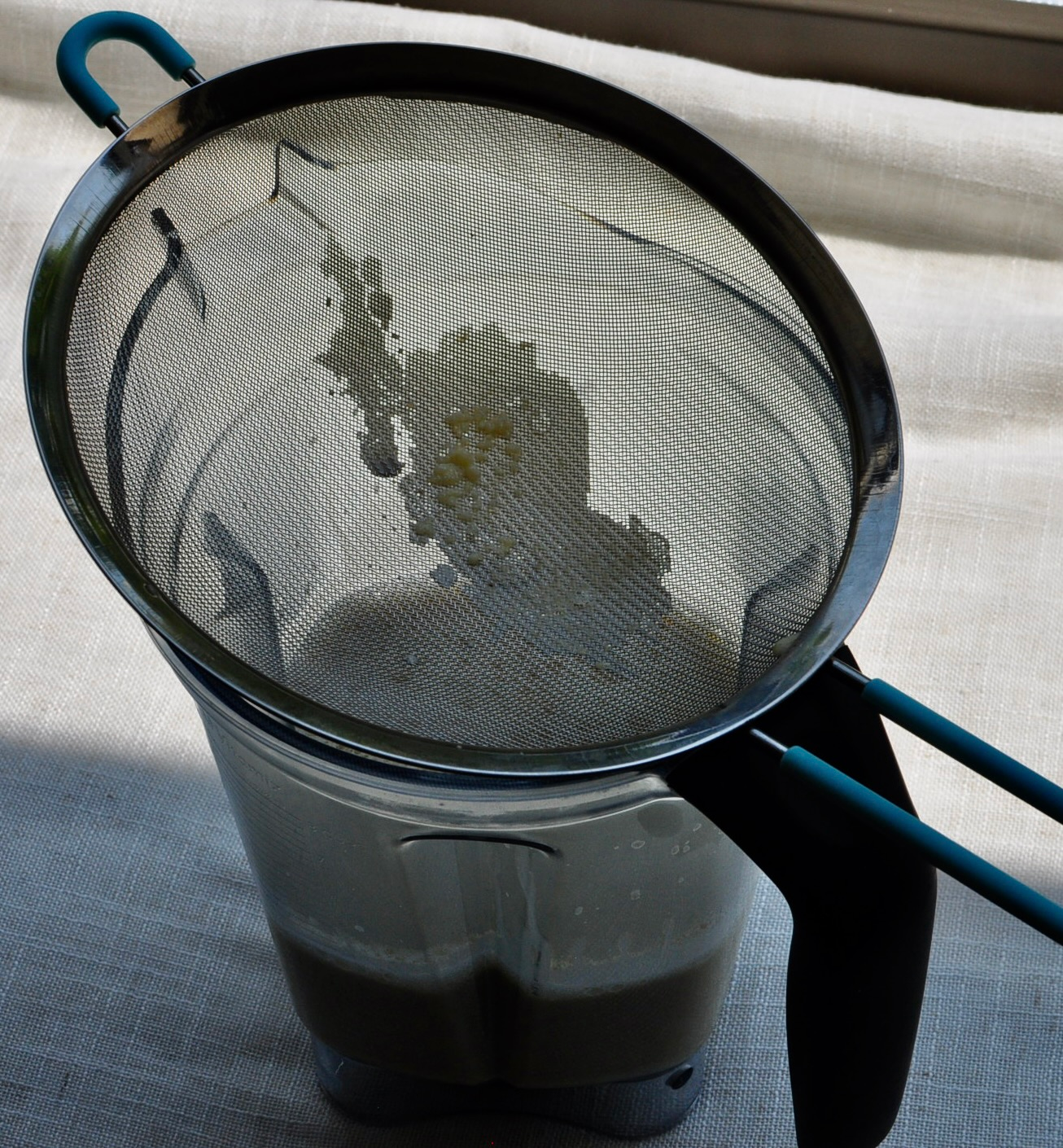 Strain Egg Yolk Custard for Black Sesame Ice Cream