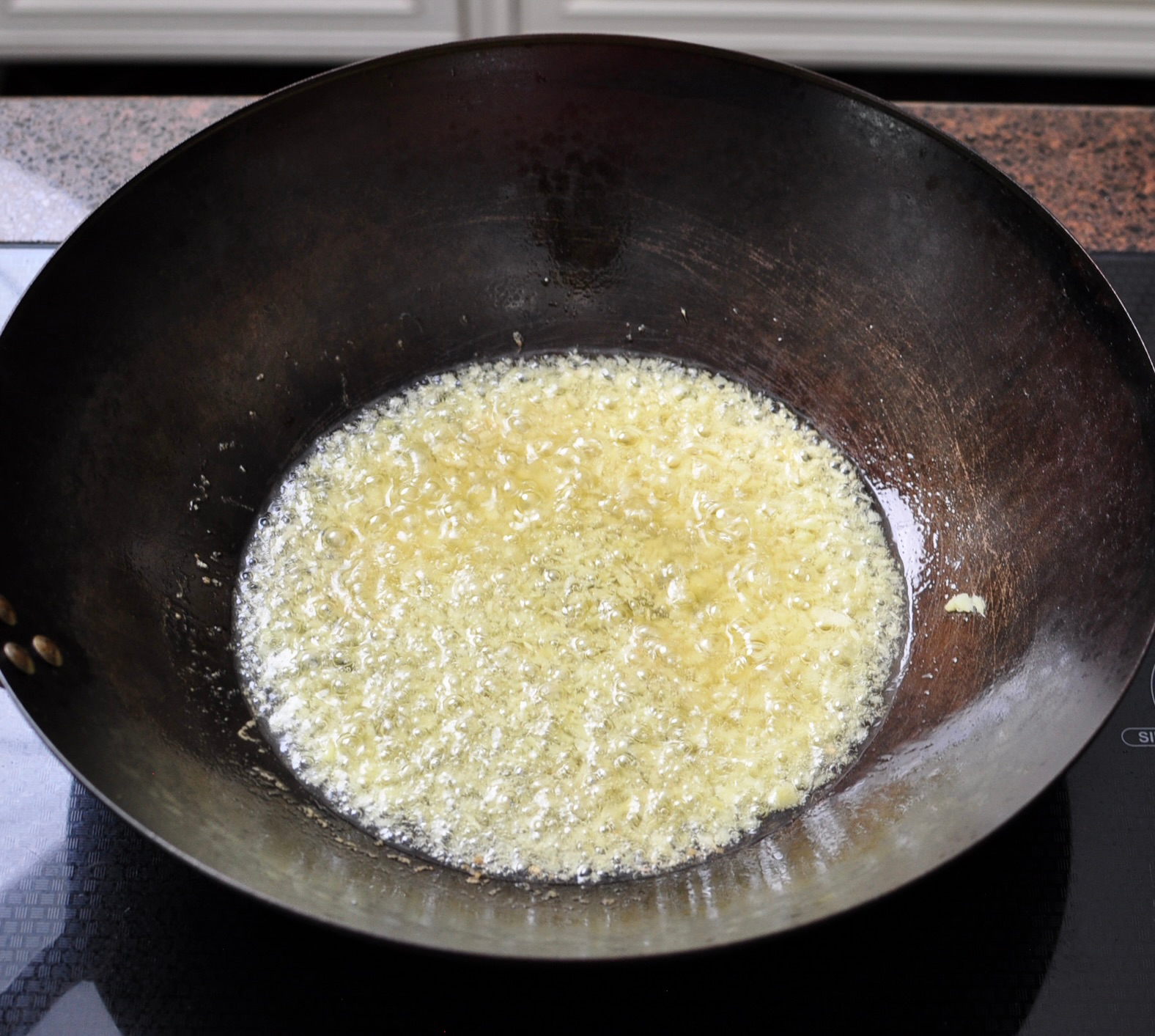 Ginger Sizzling in Hot Oil for Ginger Scallion Sauce Recipe