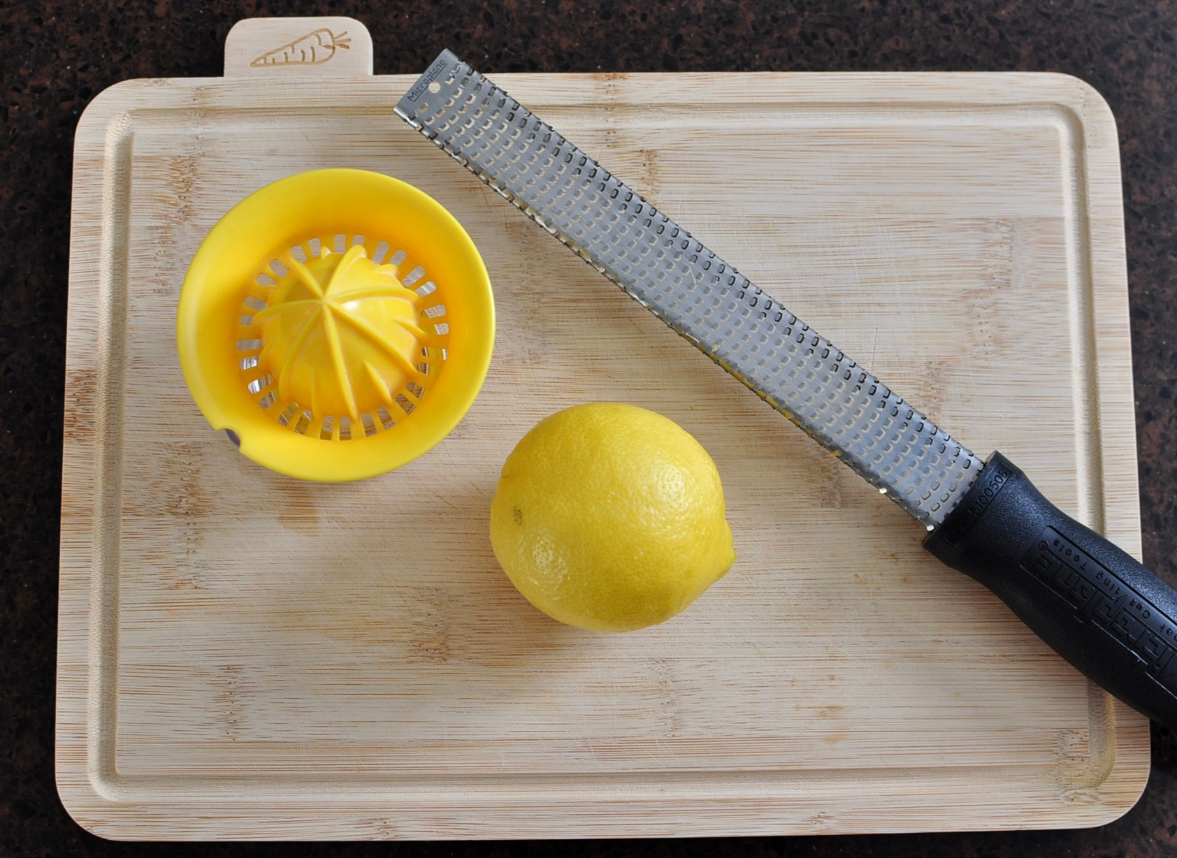 Juice and Zest Lemon for Prosciutto Arugula Roll Appetizer