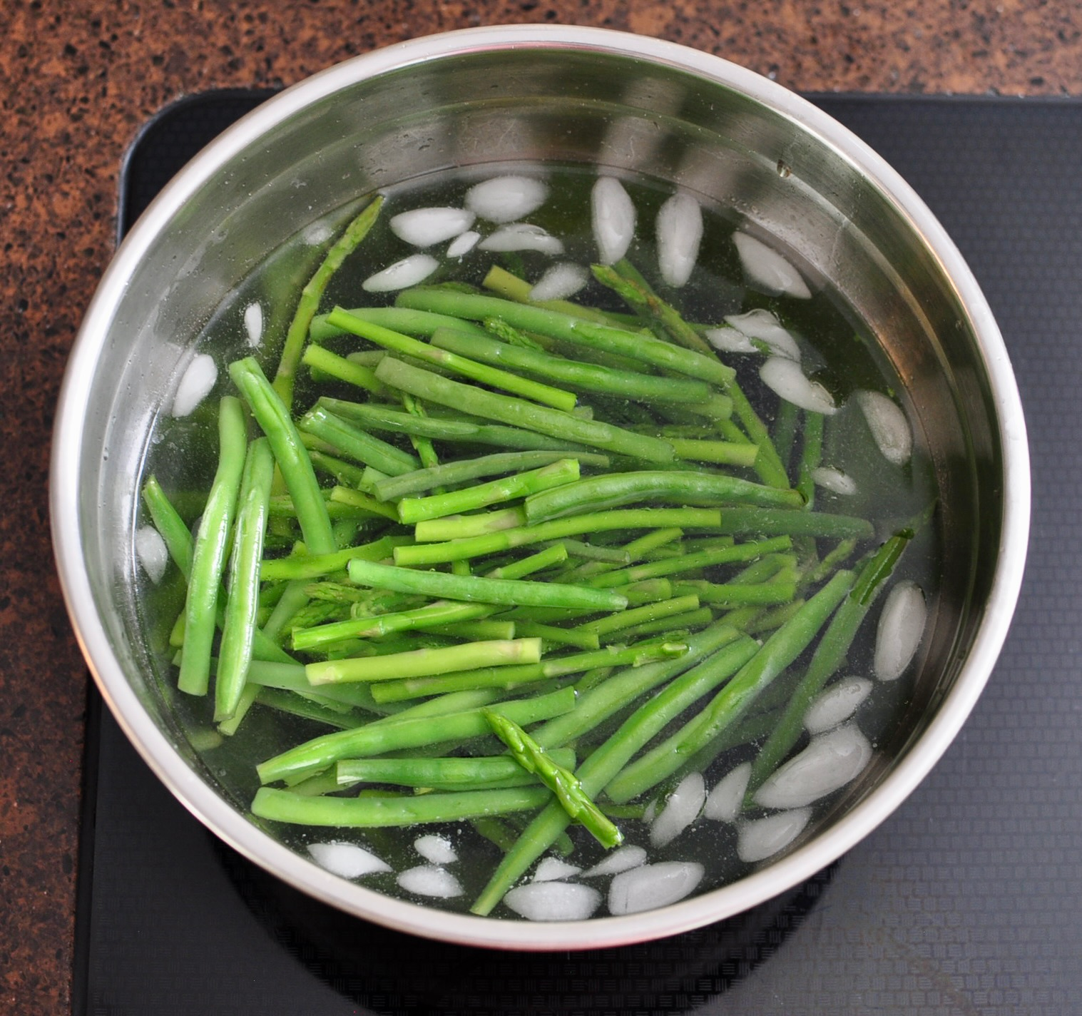 Shocked Asparagus in Ice Bath for Balthazar Salad